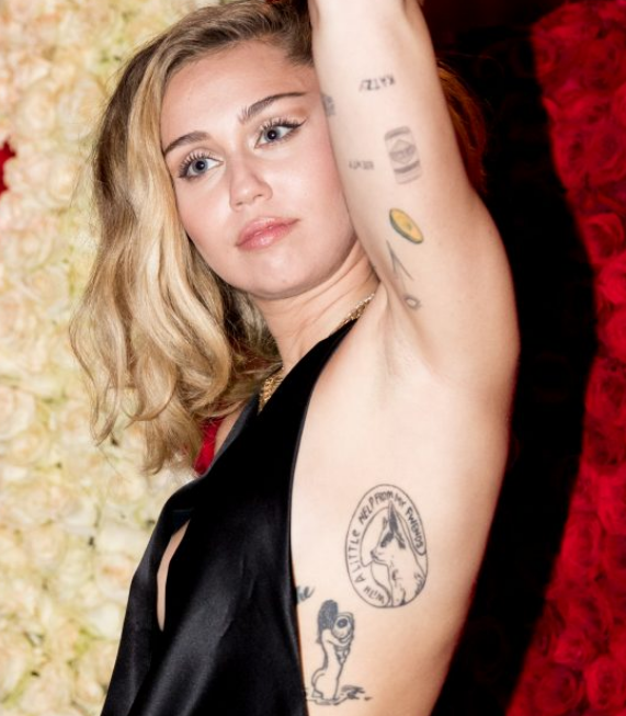 miley-cyrus-tattoos-left-arm-1 | Pleasing Vacations, Best Travel